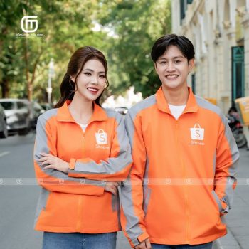 Đồng phục áo gió màu cam và ghi sáng